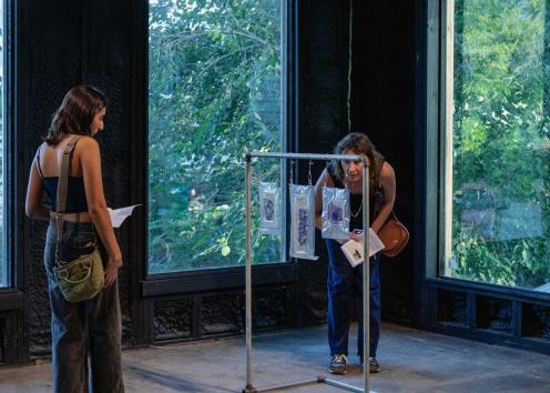 Gallery goers looking at art